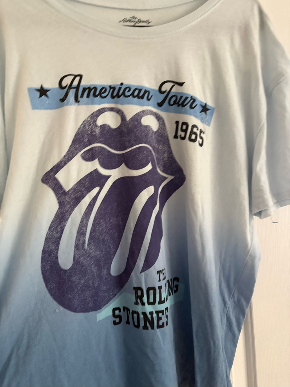 the Rolling Stones Light Blue Tee with Purple Tongue Logo